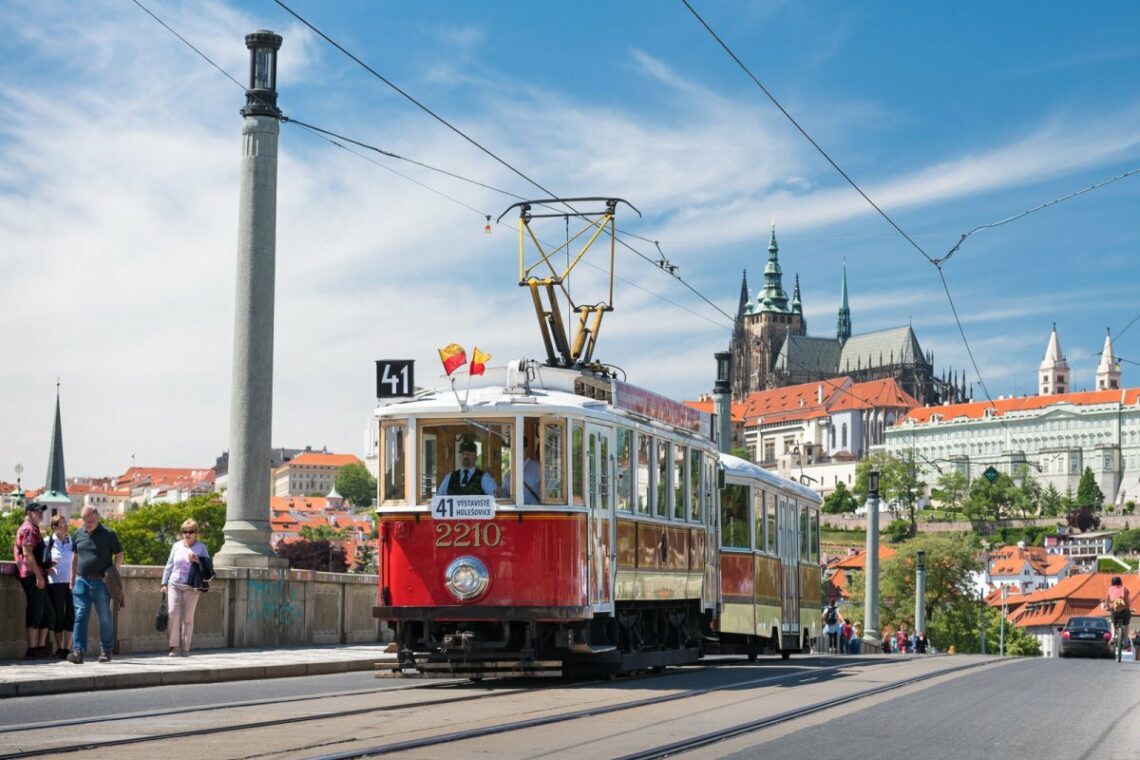 A historic tram driving through Prague